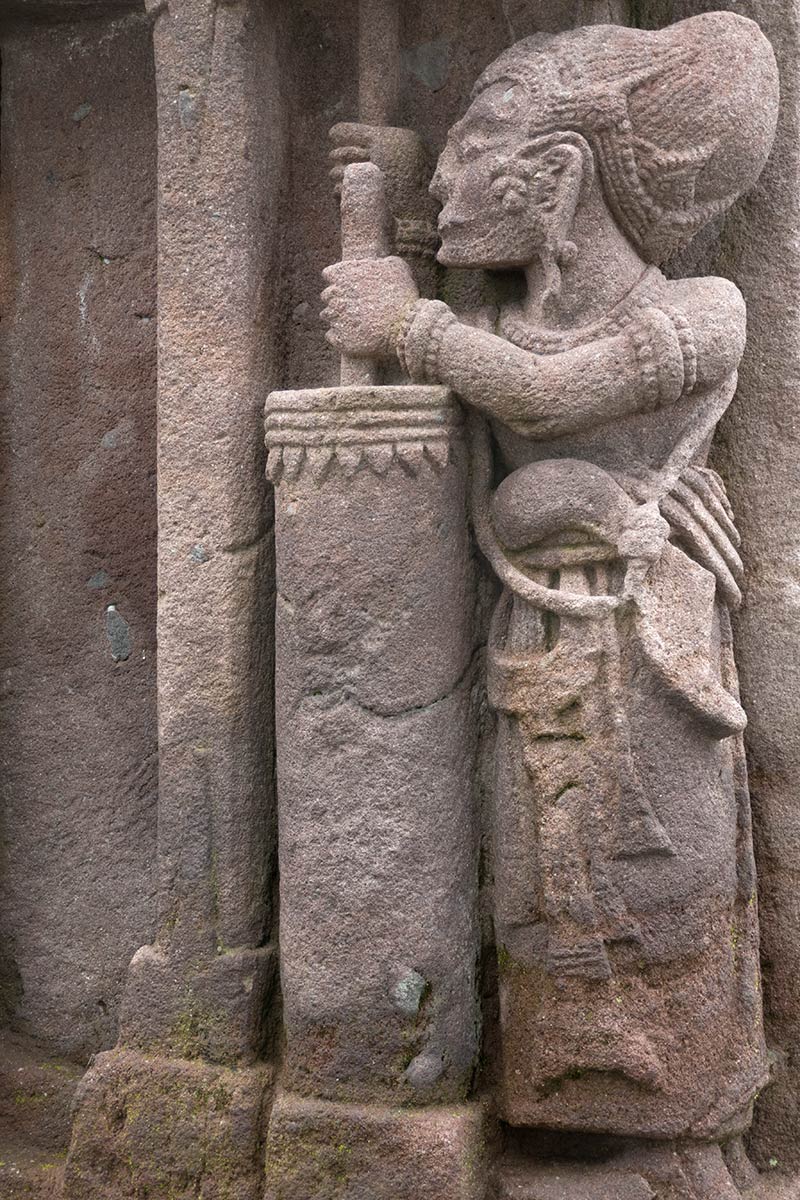 Stone sculpture of Arjuna at metal forge, Candi Sukuh