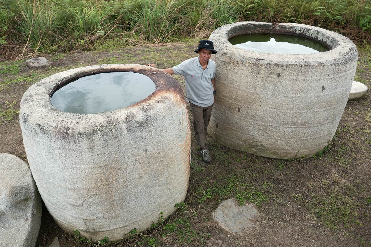 Kalambas with archaeologist Iksam Djorimi, near Hanggira village, Besoa Valley