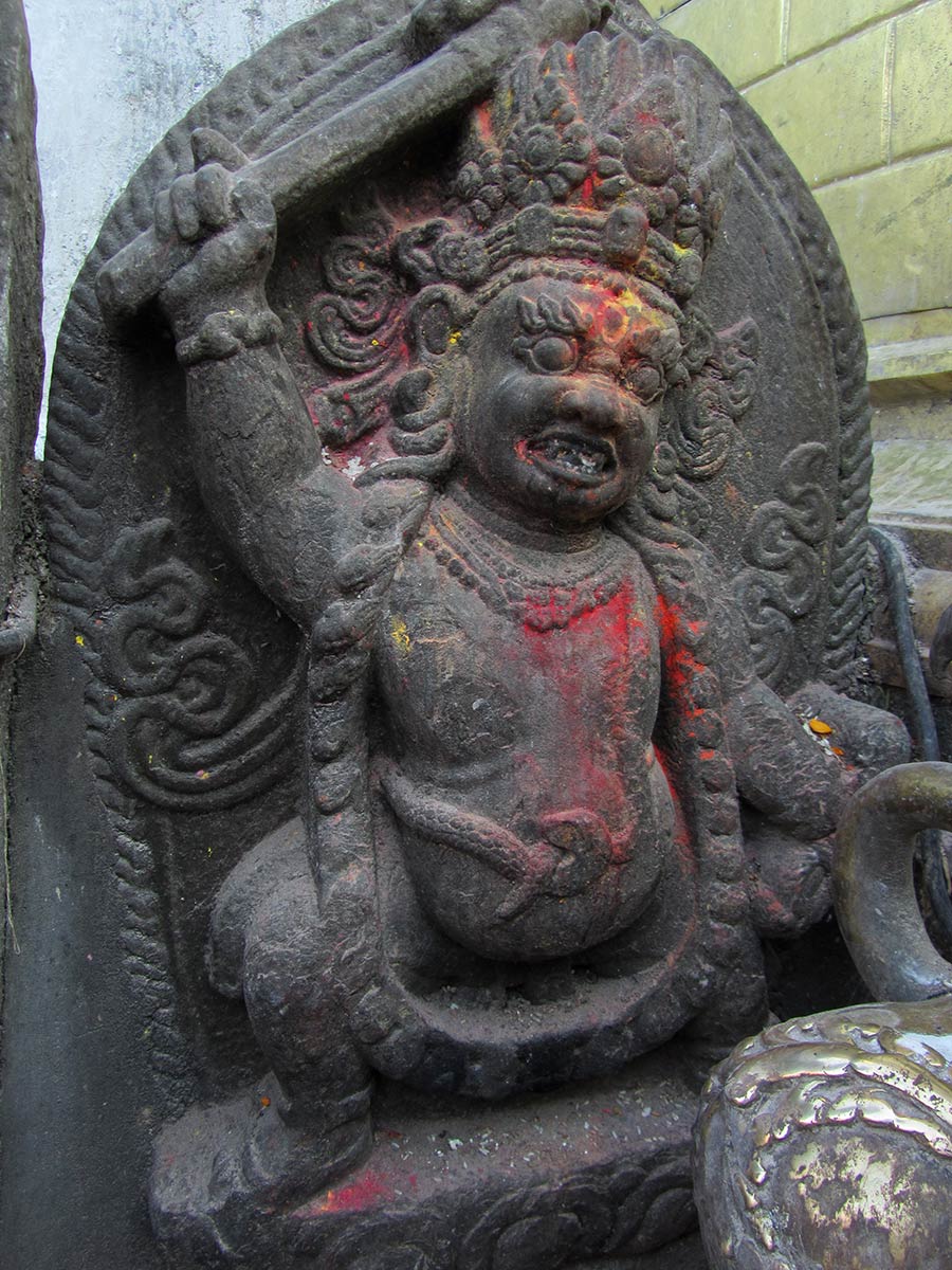 Stone Statue at Swayambhunath Stupa