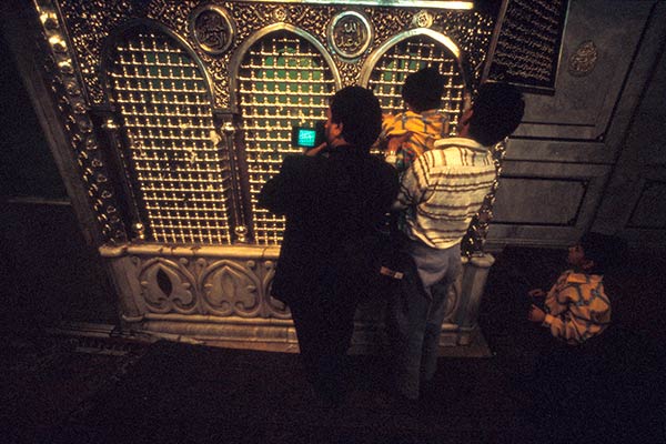 Pilgrims videotaping at the shrine of Zecharia, The Great Mosque, Damascus